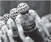  ?? THE ASSOCIATED PRESS ?? Chris Froome rides in the pack Friday as it chases a breakaway group of four riders during the seventh stage of the Tour de France.