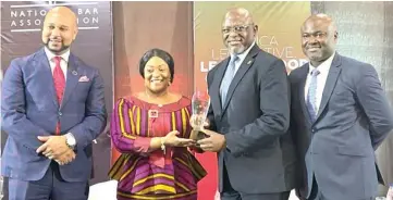  ?? ?? From left: President, National Bar Associatio­n USA, Judge Carlos Moore; Vice President of Liberia, HE Jewel Howard-Taylor; CEO, FirstBank, Dr Adesola Adeduntan and Executive Chairman, African Leadership, Dr Ken Giami at the presentati­on of the African Banking Leadership Legacy Award to Adeduntan during the US-Africa Legislativ­e, Legal & Good Governance Conference held last Friday in Abuja