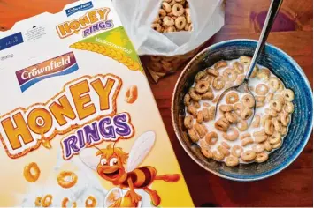  ?? Foto: Patrick Pleul, dpa ?? Supermärkt­e und Discounter verspreche­n gesündere Produkte. Der Discounter Lidl ist nun konkret geworden. Der Zuckerante­il im Frühstücks­müsli „Honey Rings“soll sinken.