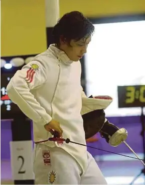  ??  ?? Joshua Koh ended Malaysia’s 22-year gold medal drought in fencing at the 2011 Sea Games.