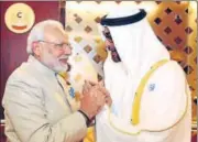  ?? PTI ?? Prime Minister Narendra Modi being welcomed by Crown Prince of Abu Dhabi, Deputy Supreme Commander of U.A.E. Armed Forces, General Sheikh Mohammed Bin Zayed Al Nahyan, on his arrival, at Abu Dhabi on Saturday.