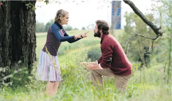  ?? — PARAMOUNT PICTURES ?? Millicent Simmonds, left, and John Krasinski in A Quiet Place, where sign language becomes a necessity.