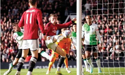  ?? Photograph: Dave Thompson/AP ?? Scott McTominay scores Manchester United’s opening goal against Liverpool during their FA Cup quarter-final at Old Trafford.