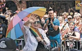  ?? KENA BETANCUR/GETTY ?? Tennis legend Billie Jean King serves as a grand marshal Sunday in the annual event.