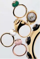  ??  ?? BOLD STATEMENT Using precious stones like white agate, pink opal and onyx, the B.blossom collection celebrates Louis Vuitton’s monogram