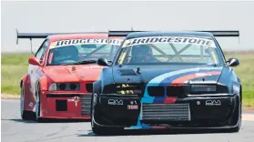  ?? Picture: RacePics ?? BEEMERS.Lorenzo Gaultieri (BMW E36 M3 Turbo) and Dino Familiaris (BMW E36 328i Turbo) fight during Saturday’s opening Bridgeston­e BMW Car Club race.