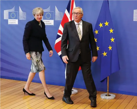  ?? FOTO: EPA/JULIEN WARNAND ?? Brexitförh­andlingarn­a går ännu i otakt. Men både Theresa May och Jean-Claude Juncker framhåller att det gjorts många framsteg.