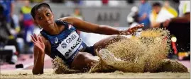  ?? (Photo AFP) ?? Rouguy Diallo va débuter les qualificat­ions du triple saut à la mi-journée ( h ). La Valettoise possède la e performanc­e des engagées.