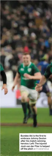  ?? GETTY/SPORTSFILE ?? Bundee Aki is the first to embrace Johnny Sexton after his match-winning heroics: Left: The injured Josh van der Flier is helped off the pitch