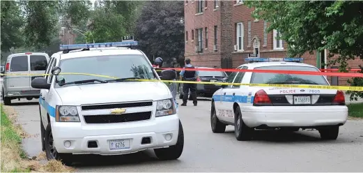  ?? SUN-TIMES FILES ?? Chicago police recover an auto in 2011 after it had been carjacked with a 1-year-old boy inside. The boy was safely returned to his mother.