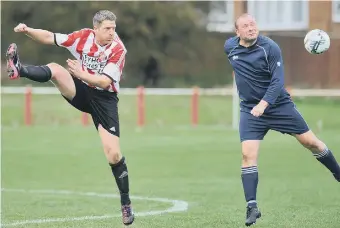  ??  ?? Ryhope Foresters (stripes) scrap against Easington CIU in the Over-40s League. Pictures by Tim Richardson.
