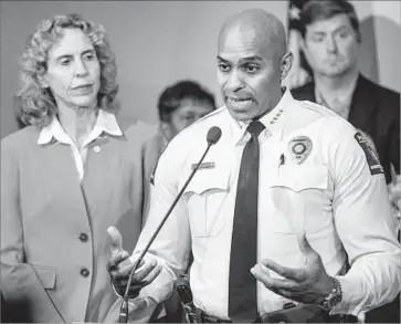  ?? Sean Rayford Getty Images ?? POLICE CHIEF Kerr Putney, right, with Charlotte Mayor Jennifer Roberts, said releasing the official police video of Keith Scott’s shooting could “inf lame the situation, exacerbate backlash, increase distrust.”