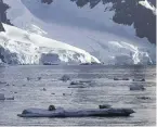  ?? ?? Antarctic sea ice floats in the water in the Lemaire Channel off Antarctica