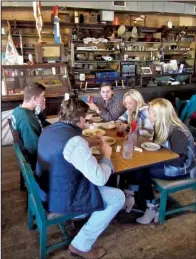  ?? Special to the Democrat-Gazette/MARCIA SCHNEDLER ?? Diners at Cotham’s Mercantile in Scott are surrounded by a museum’s worth of old-time merchandis­e and collectibl­es.