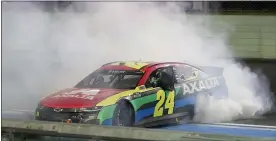  ?? WILFREDO LEE — THE ASSOCIATED PRESS ?? William Byron does doughnuts as he celebrates after winning Sunday’s Cup Series race.