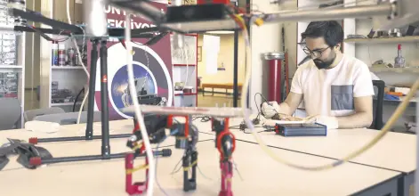  ?? ?? A researcher works on the mobile electrocau­tery device at OSTIM Technical University, Ankara, Turkey, May 13, 2022.