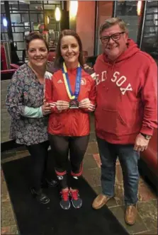 ?? PHOTO COURTESY ALLIE MACNEILL ?? Phoenixvil­le native Allie MacNeill poses with her mom Lisa and her Dad Steve after finishing the Boston Marathon Monday.