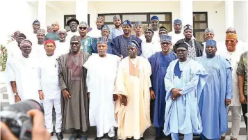  ?? ?? President Bola Ahmed Tinubu ( middle); Vice President Sen. Kashim Shettima ( 4th left) in a group photograph with members of the Nigeria Governors' Forum ( NGF) during the Sallah homage at President Tinubu’s Lagos Residence… yesterday