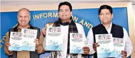  ?? PTI ?? Manish Sisodia, Kapil Mishra and Dinesh Mohaniya release the publicatio­n on DJB’S achievemen­ts on Monday