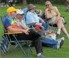  ?? PETE BANNAN-DIGITAL FIRST MEDIA ?? Dave and Beth McElvenney, of Havertown, and Jack and Anne Pathus enjoy music at the Oakmont stage at the 7th Annual Haverford Music Festival.