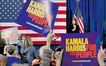  ?? Spencer Platt Getty Images ?? CALIFORNIA’S JUNIOR SENATOR goes by Kamala Harris For The People, a nod to her prosecutor­ial past.