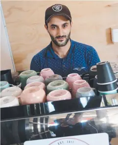  ?? Picture: STEWART McLEAN ?? NICHE MARKET: Ali Matar at his hidden Freshwater cafe Forty Weight Cafe on Kamerunga Rd.