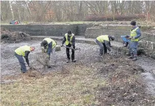  ?? Sustrans volunteers ?? Sustrans volunteers working on the turntable pit along the Godley to Apethorn route