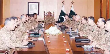  ?? Agence France-presse ?? ↑ Qamar Javed Bajwa (centre) chairs a Corps Commanders’ meeting in Rawalpindi on Tuesday.