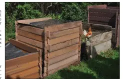  ?? AP/LEE REICH ?? A good compost bin makes easy work of adding ingredient­s or removing compost and also fends off scavengesr and retains heat and moisture.