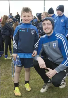  ??  ?? Best Academy Boy Brogin O’Driscoll is presented with his award by by Sean Mescall.