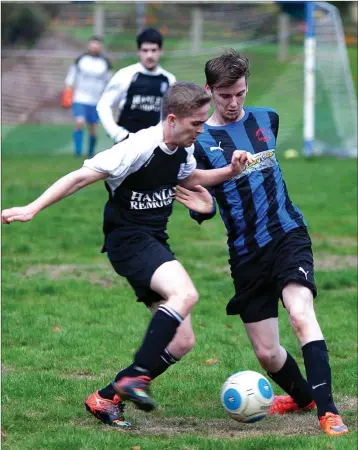  ??  ?? Conary’s David Byrne and Newtown’s Mark O’Brien battle for possession during their Division 1 game.