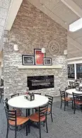  ?? PROVIDED BY KOBE EAMES ?? This floor to ceiling stone fireplace is among new amenities at Pueblo’s Golden Corral which reopened this week after extensive remodeling.