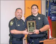  ?? Doug Walker ?? Georgia State Patrol Sgt. Ean Cain (left) presented TFC Stan Smith with a Respect for Law award during a luncheon in Rome Monday Rome Police Maj. Rodney Bailey (left) presented the Respect for Law award to Officer Scott Kent.