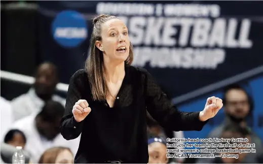  ??  ?? California head coach Lindsay Gottlieb instructs her team in the first half of a first round women's college basketball game in the NCAA Tournament. — Ti Gong