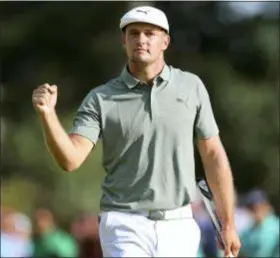  ?? MEL EVANS — THE ASSOCIATED PRESS ?? Bryson DeChambeau celebrates a birdie putt on the 18th hole during the third round of the Northern Trust golf tournament, Saturday in Paramus, N.J.