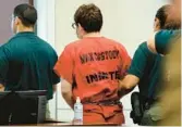  ?? AMY BETH BENNETT/SOUTH FLORIDA SUN SENTINEL ?? Marjory Stoneman Douglas High School shooter Nikolas Cruz is escorted from the courtroom on Oct. 14. He will be formally sentenced to life in prison after more than four years.