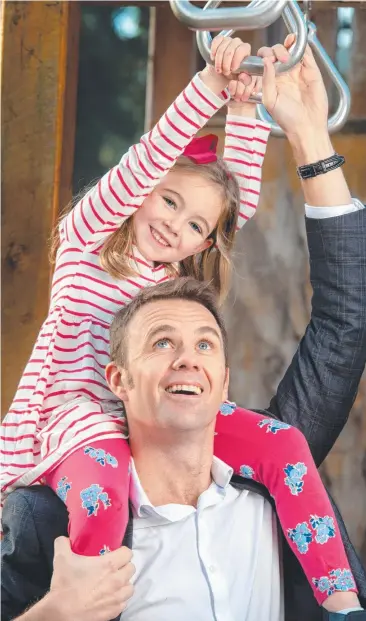  ??  ?? ROLE MODEL: Andrew Wilson sets a good example for his daughter Ivy, 5. Picture: JAY TOWN