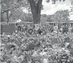  ?? JAY JANNER/AUSTIN AMERICAN-STATESMAN ?? A memorial is seen June 1, 2022, for victims at Robb Elementary School.