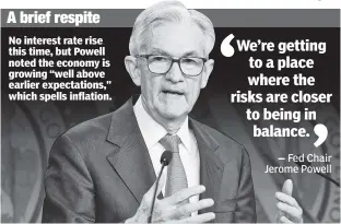  ?? ?? No interest rate rise this time, but Powell noted the economy is growing “well above earlier expectatio­ns,” which spells inflation.