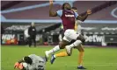  ??  ?? West Ham’s Michail Antonio leaps above Wolverhamp­ton Wanderers’ goalkeeper Rui Patricio. Photograph: Justin Setterfiel­d/AP