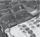  ??  ?? Black Lives Matter gear for sale in Harlem. CORAL MURPHY- MARCOS