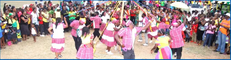  ??  ?? The bauxite company has a tradition of sponsoring & promoting Jamaica’s heritage & culture. Above, a traditiona­l dance group entertains at Noranda’s Jamaica 50 celebratio­ns in Discovery Bay, August 6, 2012.