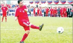  ?? SRENG MENG SRUN ?? Prime Minister Hun Sen takes part in a friendly football match in September 2011.