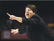  ?? Gail Burton / Associated Press ?? Quinnipiac head coach Tricia Fabbri instructs her team during the first half of an NCAA women’s basketball game against Maryland on Nov. 24 in College Park, Md.