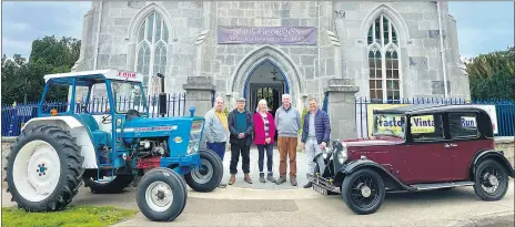  ?? ?? Liam O’Donnell’s Ford 4000 and JJ O’Mahony’s 1933 Austin 10, frame the front of Saint George’s Arts and Heritage Centre in Mitchelsto­wn, which will be the beneficiar­y of the upcoming Tractor and Vintage Car Run on Sunday, 14th May. In the photograph are Bill Power, Liam O’Donnell, Eileen Hyland, Tom Hyland and JJ O’Mahony.