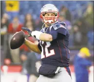  ?? Elise Amendola / Associated Press ?? New England Patriots quarterbac­k Tom Brady warms up before playing the Minnesota Vikings in Foxborough, Mass., on Sunday. Brady has won 12 of his last 13 starts within the division, but has yet to figure out playing in Miami.