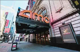  ?? EVAN AGOSTINI/INVISION/AP, FILE ?? The AMC Empire 25 theater appears on 42nd Street on May 13, 2020, in New York. Movie theaters in New York City reopened Friday.