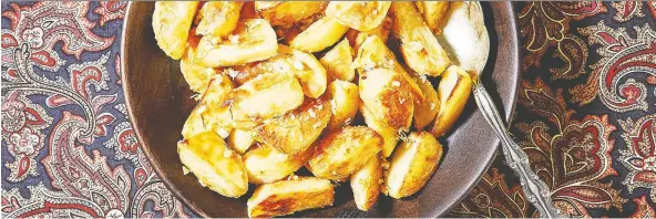  ?? STACY ZARIN GOLDBERG/FOR THE WASHINGTON POST ?? These roasted potatoes feature the best of both worlds — dreamlike fluffy insides and tasty, crispy skins. No ketchup required.