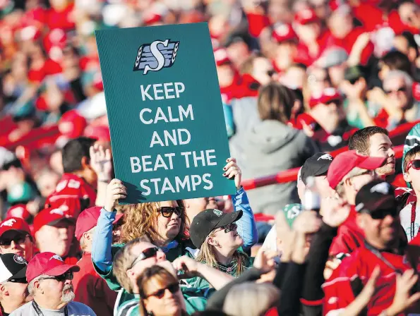  ?? JEFF MCINTOSH/THE CANADIAN PRESS. ?? Calm in the face of adversity, the Saskatchew­an Roughrider­s looked good downing the Calgary Stampeders 29-24 on Saturday at Mcmahon Stadium.