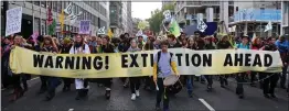  ??  ?? FLASHPOINT: Climate protesters marching in Central London in October